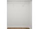 White walk-in closet with metal shelving and wood floors at 6201 Davids Se Way, Acworth, GA 30102