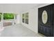 View of front porch with dark door and window at 6201 Davids Se Way, Acworth, GA 30102