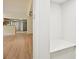 Hallway featuring bench seating, a view into the kitchen and entryway beyond at 6201 Davids Se Way, Acworth, GA 30102