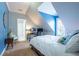 Comfortable bedroom offers an ensuite bath, charming dormer, and plenty of space for relaxing at 1075 Bluffhaven Way Northeast Ne Way, Atlanta, GA 30319
