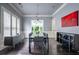 Elegant dining room with stylish light fixture, sleek buffet, and shuttered windows for natural light at 1075 Bluffhaven Way Northeast Ne Way, Atlanta, GA 30319