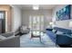 Bright living room featuring ample seating, natural light, and a view of the front yard at 1075 Bluffhaven Way Northeast Ne Way, Atlanta, GA 30319