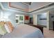 Spacious main bedroom with tray ceilings and a seating area at 1075 Bluffhaven Way Northeast Ne Way, Atlanta, GA 30319