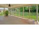Spacious screened porch offers an ideal outdoor space for relaxation and entertainment at 115 Creek Cir, Stockbridge, GA 30281