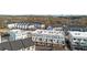 An aerial view of a residential area with modern townhomes and community spaces at 2030 Main Nw St # 205, Atlanta, GA 30318