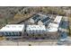Aerial view showcasing multi-Gathering homes with ample parking and landscaping at 2030 Main Nw St # 205, Atlanta, GA 30318