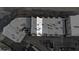 Aerial view highlighting the rooftop and the surrounding townhome community at 2030 Main Nw St # 205, Atlanta, GA 30318