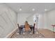 Dining room area features recessed lighting, hardwood floors, and geometric accent wall at 2030 Main Nw St # 205, Atlanta, GA 30318