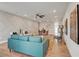 Inviting living room with stylish decor, ceiling fan, hardwood floors, and a unique accent wall at 2030 Main Nw St # 205, Atlanta, GA 30318