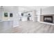 Open-concept living room and kitchen with modern finishes and plenty of natural light at 5 Citation Ct, Ellenwood, GA 30294