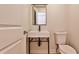 Modern half bathroom features a vessel sink and sleek faucet at 2189 Cedar Forks Dr, Marietta, GA 30062