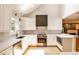 Well-lit kitchen featuring modern stainless steel appliances and white marble countertops at 2189 Cedar Forks Dr, Marietta, GA 30062