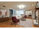 Inviting living room with hardwood floors, fireplace and modern furnishings at 2189 Cedar Forks Dr, Marietta, GA 30062