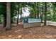 Sign for the East Cobb Swim & Tennis Club, highlighting community amenities at 2189 Cedar Forks Dr, Marietta, GA 30062