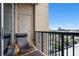 Relaxing balcony featuring a chair and ottoman with a pleasant view at 4561 Olde Perimeter Way # 806, Dunwoody, GA 30346