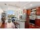 This condo has an open concept living space with a kitchen, dining, and living area, and city views at 4561 Olde Perimeter Way # 806, Dunwoody, GA 30346