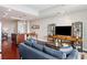 Open concept living space with hardwood floors, a gourmet kitchen and bright lighting at 4561 Olde Perimeter Way # 806, Dunwoody, GA 30346