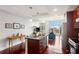 This condo has an open floor plan with a kitchen island and views to the city skyline at 4561 Olde Perimeter Way # 806, Dunwoody, GA 30346