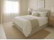 Bedroom with neutral decor, rug, and large windows providing ample natural light at 1100 Tuxedo Dr, Roswell, GA 30075