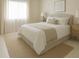 Neutral bedroom featuring plush bedding, decorative rug, and lots of natural light at 1100 Tuxedo Dr, Roswell, GA 30075