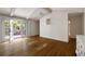 Bedroom featuring hardwood floors, exposed beams and walk-out to deck at 1100 Tuxedo Dr, Roswell, GA 30075