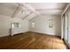 Spacious bedroom features vaulted ceilings, exposed beams, and French doors at 1100 Tuxedo Dr, Roswell, GA 30075