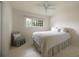 Cozy bedroom featuring a ceiling fan and a window view at 1100 Tuxedo Dr, Roswell, GA 30075
