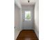 Bright entryway with hardwood floors and a door that lets in natural light at 1100 Tuxedo Dr, Roswell, GA 30075