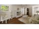 Inviting living room features a fireplace, hardwood floors, and neutral décor at 1100 Tuxedo Dr, Roswell, GA 30075