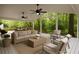 Inviting porch with comfortable seating and serene wooded views at 1100 Tuxedo Dr, Roswell, GA 30075