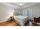 Cozy bedroom with hardwood floors, natural light, and neutral decor creating a serene atmosphere at 50 Biscayne Nw Dr # 4110, Atlanta, GA 30309