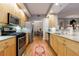 Well-equipped kitchen with stainless steel appliances, granite counters, and hardwood floors at 50 Biscayne Nw Dr # 4110, Atlanta, GA 30309