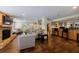 Expansive living area with stone fireplace, bar and ample seating at 50 Biscayne Nw Dr # 4110, Atlanta, GA 30309