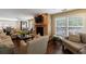 Cozy living room with stone fireplace and comfortable seating arrangement at 50 Biscayne Nw Dr # 4110, Atlanta, GA 30309