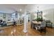 Spacious living and dining area with hardwood floors, stylish wallpaper, and ample natural light at 50 Biscayne Nw Dr # 4110, Atlanta, GA 30309