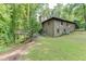 Spacious backyard with lush lawn and multi-level deck at 5930 Bridle Dr, Cumming, GA 30028