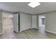 Finished basement with large open space and vinyl flooring at 5930 Bridle Dr, Cumming, GA 30028