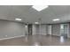 Unfinished basement space with multiple entryways and potential for customization at 5930 Bridle Dr, Cumming, GA 30028