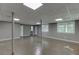 Large basement featuring open floor plan, ample natural light, and neutral paint at 5930 Bridle Dr, Cumming, GA 30028