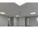 Finished basement with vinyl floors and recessed lighting at 5930 Bridle Dr, Cumming, GA 30028