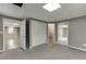 Basement area features a closet and multiple doorways for easy access at 5930 Bridle Dr, Cumming, GA 30028