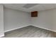 Finished basement with vinyl flooring at 5930 Bridle Dr, Cumming, GA 30028