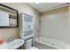 Traditional bathroom with built-in storage, tub, and shower combination at 5930 Bridle Dr, Cumming, GA 30028