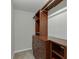 Custom closet with wood shelving and drawers at 5930 Bridle Dr, Cumming, GA 30028