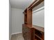 Walk-in closet with custom built-in shelving and drawers providing ample storage at 5930 Bridle Dr, Cumming, GA 30028