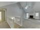 Bright living room featuring a fireplace, vaulted ceilings, and ample natural light at 5930 Bridle Dr, Cumming, GA 30028