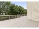 Expansive back deck with wood railing, providing ample space for outdoor enjoyment at 1565 Briergate Dr, Duluth, GA 30097