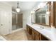 Large bathroom with shower and double sinks offering plenty of room at 1565 Briergate Dr, Duluth, GA 30097