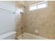 Standard bathroom featuring tile walls and shower combo at 1565 Briergate Dr, Duluth, GA 30097