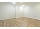 Cozy bedroom features clean white walls and hardwood floors at 1565 Briergate Dr, Duluth, GA 30097